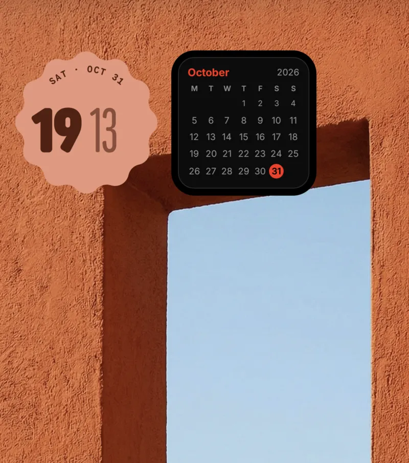 A real Android home screen: a terracotta wall photo, with a scalloped clock reading 19:13 and a black October calendar widget.